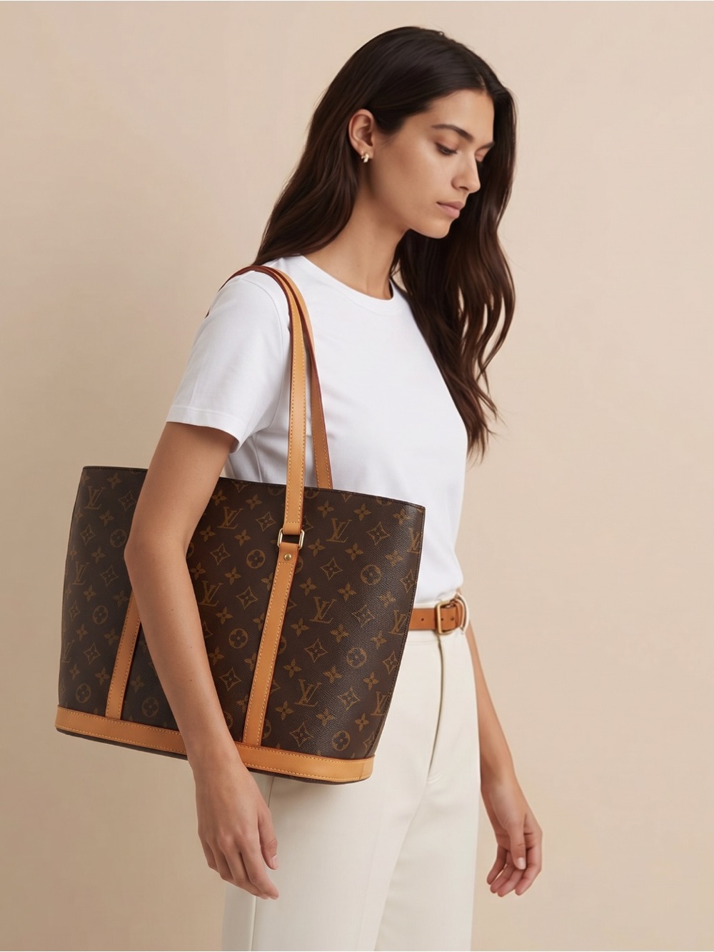 - Authentic Louis Vuitton BABYLONE Tote Shoulder Bag.